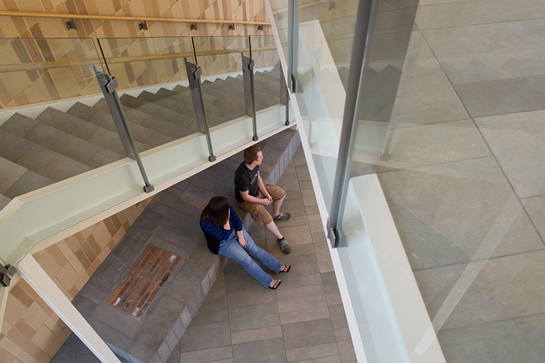 Monumental staircase seen from second floor landing